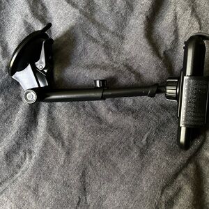 Cell phone holder for vehicle